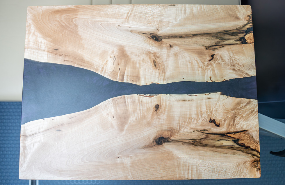 Lagun Cafe Table Inlaid With Black Resin in Davey Jackson 170 Pro Camper Van by Off Highway Van