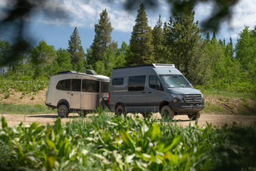 2026 Off Highway Van Doc Holliday 144 Offroad Off-Grid Mercedes Sprinter Camper Van Towing an Airstream Trailer