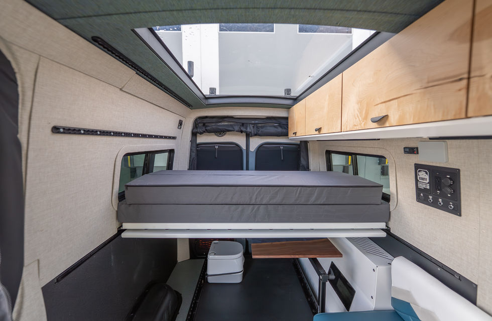 Expanding Bedframe in a 2025 Custom Sundance Kid 144 Pro-X Off-Grid Camper Van Engineered by Off Highway Van