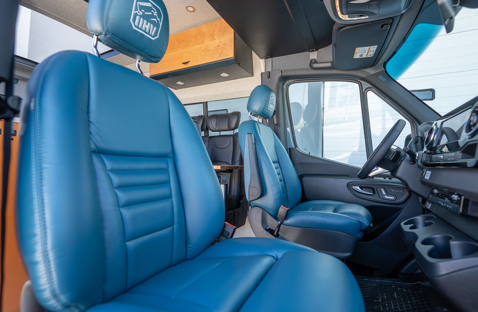 Custom Leather Front Seats in a Mercedes Sprinter Offroad Off Grid Adventure Camper Van by Off Highway Van