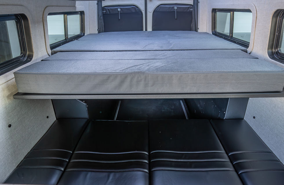Cafe Seat System in Bed Mode with Bed Expanded in Davey Jackson 170 Pro-X Adventure Camper Van