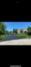 Freshly sealed asphalt driveway