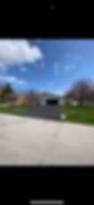 Asphalt driveway freshly sealed in Sheboygan/Manitowoc