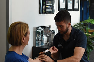 Exercise Physiologist performing an initial assessment