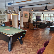 The Pool Table: A space to hone your putting skills!