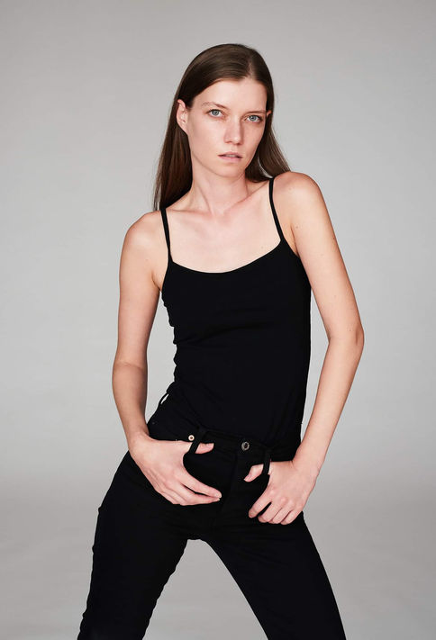 Model in black top