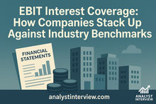 Text on financial statements with bar chart, stacked coins, and buildings. Reads: EBIT Interest Coverage: How Companies Stack Up.