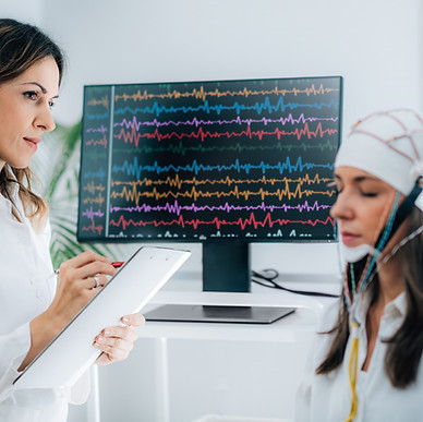 Female Patient in a Neurology Lab doing EEG Scan.jpg