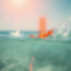 ACTUAL ORANGE NEON LIGHT (LIKE A NEON SIGN WITH AN _I_) DIPPED IN THE OCEAN ON A SUNNY DAY.jpg