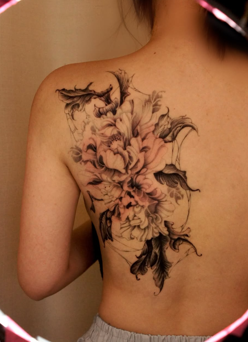 Fine line flower tattoo