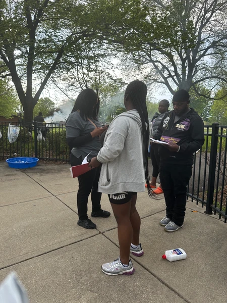 Not My Sons and Daughters team members engaging with the community with free hot dogs, hamburgers, snacks and waters on one of Chicago's first signs of summer. 