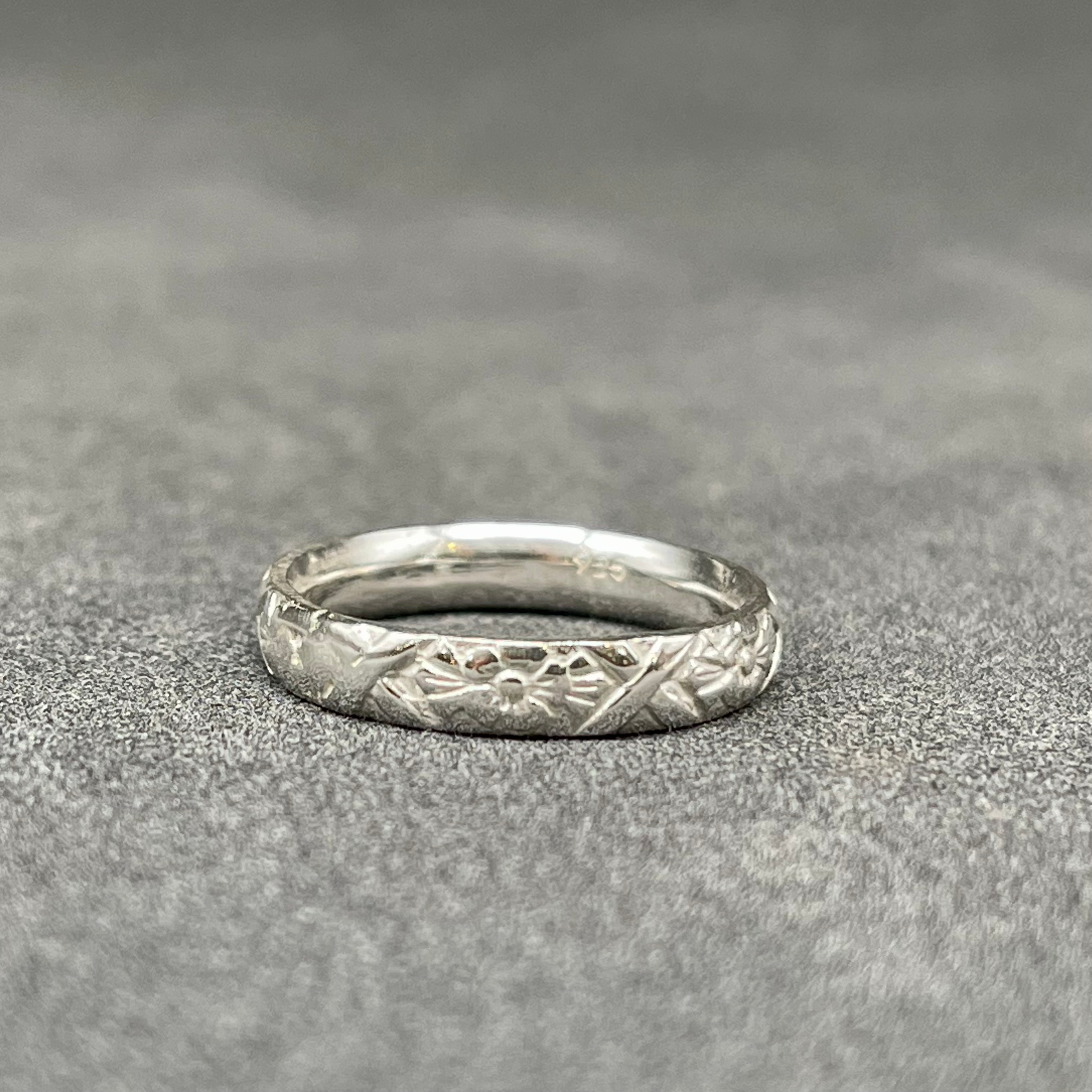 Silver flower etched ring