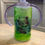 Thumbnail: A super cute, 12oz green kids tumbler featuring an adorable sleeping bear.