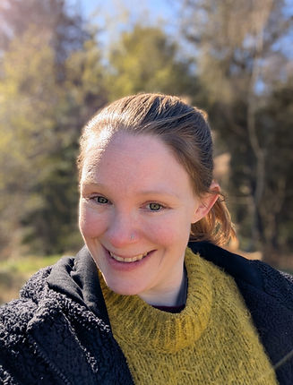 Picture of Katie Sands outdoors smiling into the camera