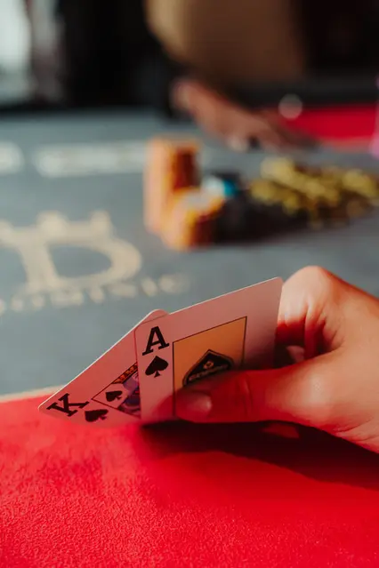 Close-up of a player holding an Ace card during a Blackjack game at Casino Dominic in Cap Cana, Punta Cana