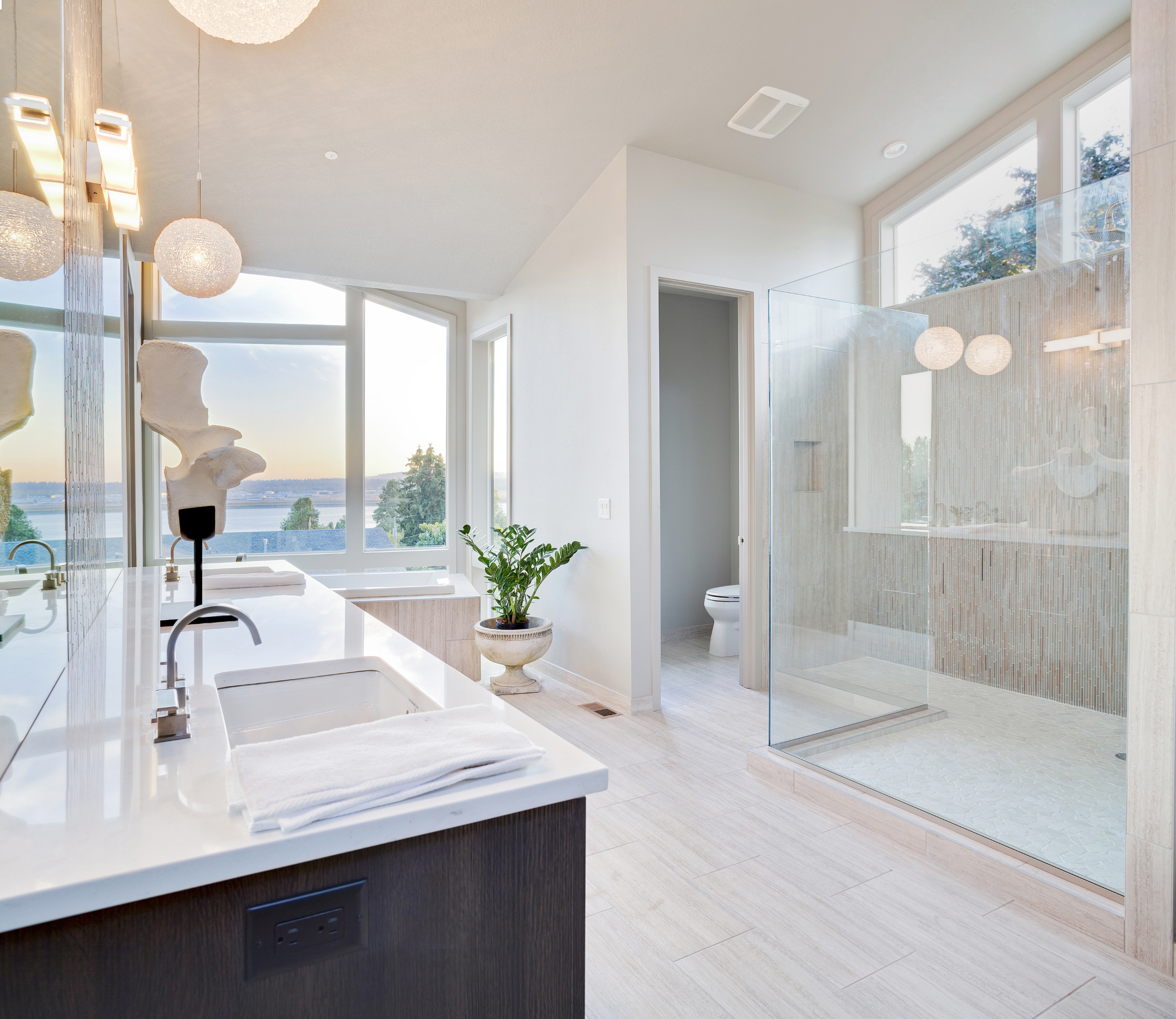 Luxurious and modern bathroom design with marble accents and sleek fixtures.