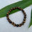 Thumbnail: Japamala Tiger Eye Bead Bracelet