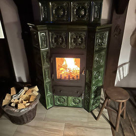 Přestavba kachlových kamen - původní stav
vzor mušle, glazura zelená, původní vložka S3