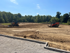 Heavy equipment performing earthwork and site grading in Franklin Indiana