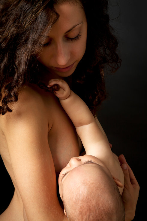 Mother-breastfeeding-her-little-baby-509