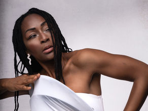 Amana Melome posing with graphic white eyeliner