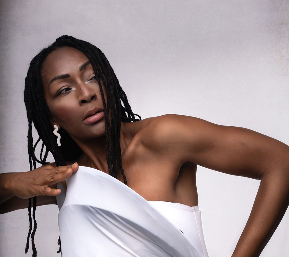 Amana Melome posing with graphic white eyeliner