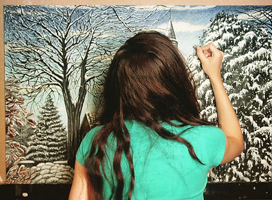 The artist, Chantell Van Erbé working in her studio on Parish in Winter