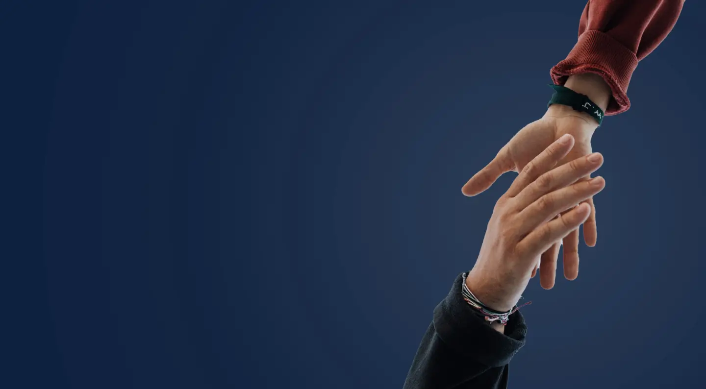 two_hands_clasping_careteam_bg.webp