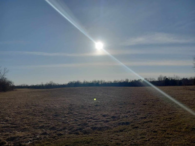 Amazing sun over hayfield