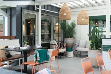 Outdoor patio and lounge area at Little Coyote restaurant, Historic St. Elmo, Chattanooga, TN, commercial painting and finishes by Dream Team Finishes