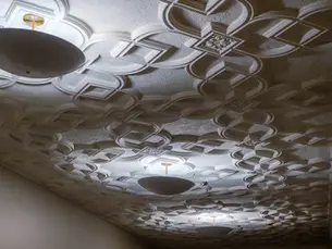 The finished result — fully restored 1927 ornamental plaster ceiling at The Waymark Hotel, Chattanooga, TN. From delaminated and damaged to landmark-worthy, by Dream Team Finishes