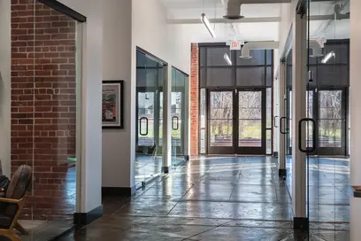 Custom commercial painting and specialty finishes in open lounge area at LEO Events, Chattanooga, TN, by Dream Team Finishes