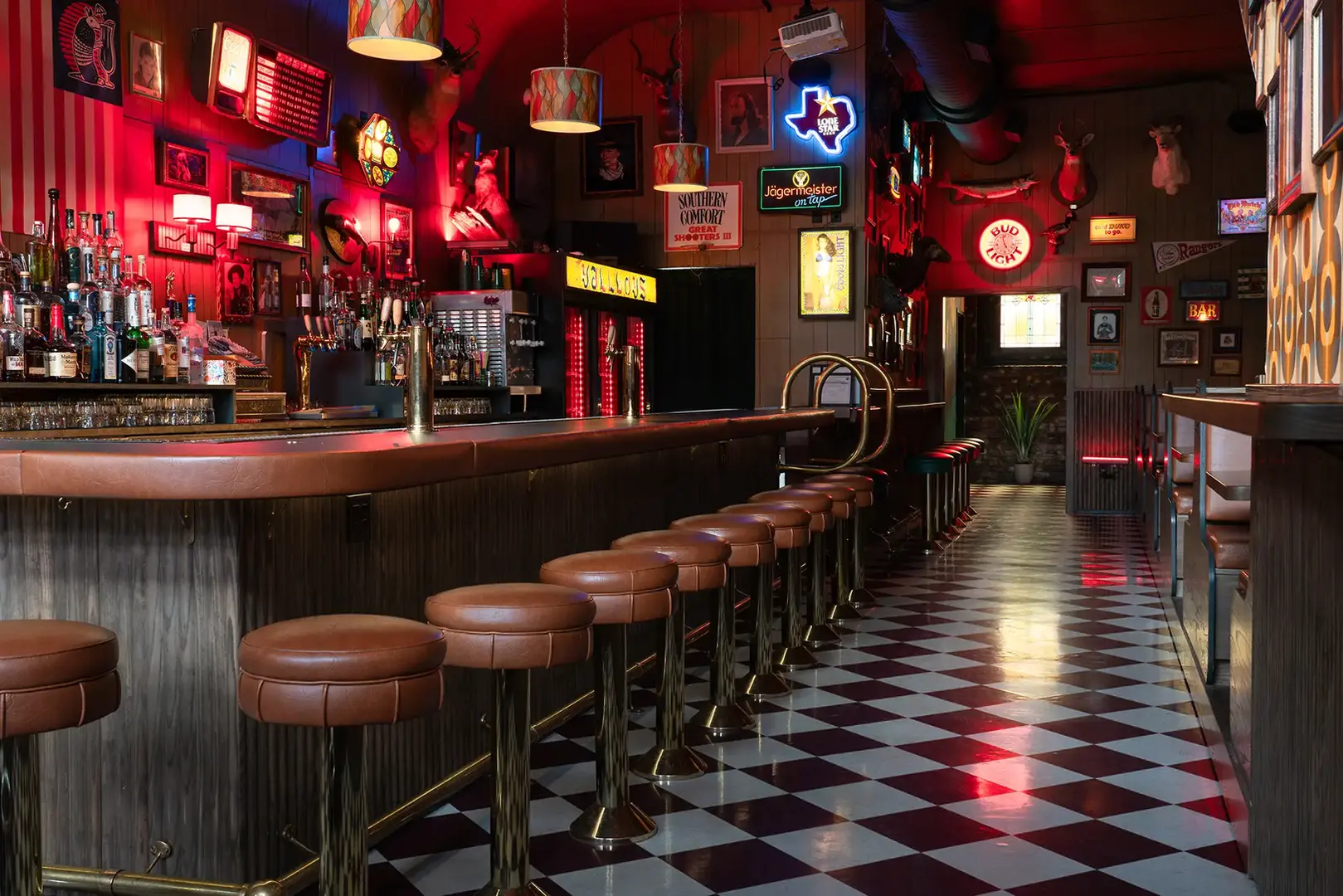 Custom commercial painting and specialty finishes at the bar area of Bless Yer Heart, Chattanooga, TN, by Dream Team Finishes