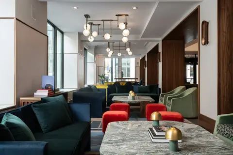 Hotel lobby lounge with custom commercial painting and specialty finishes at The Waymark Hotel, Tapestry Collection by Hilton, Chattanooga, TN, by Dream Team Finishes