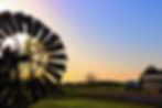 scenic picture of windmill on family farm