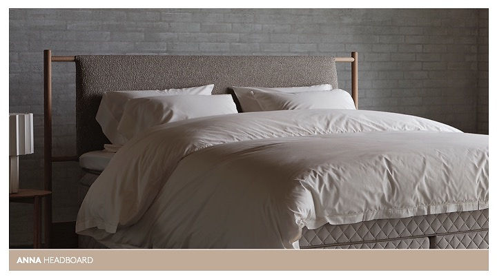 Ambia Sleep System bed with white bedding