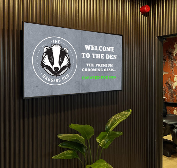 Digital display with 'Welcome to The Badgers Den'