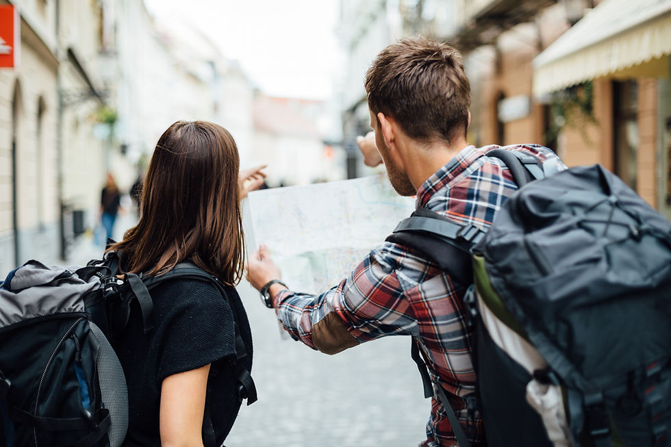 Travelers Examining Map