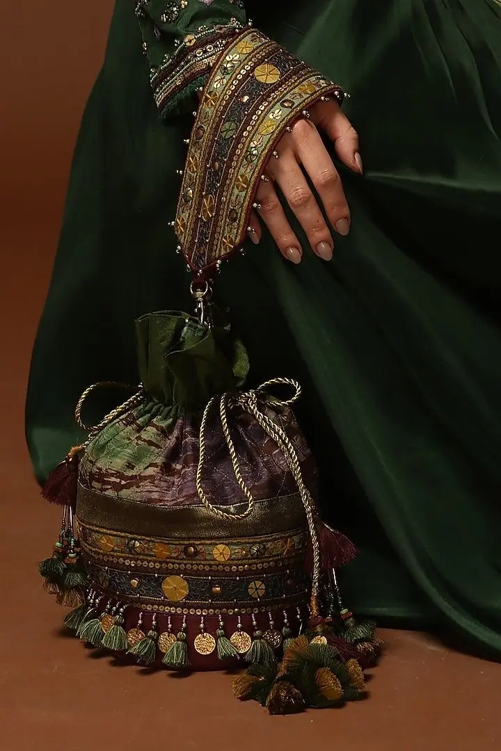 Hand embroidered clutch