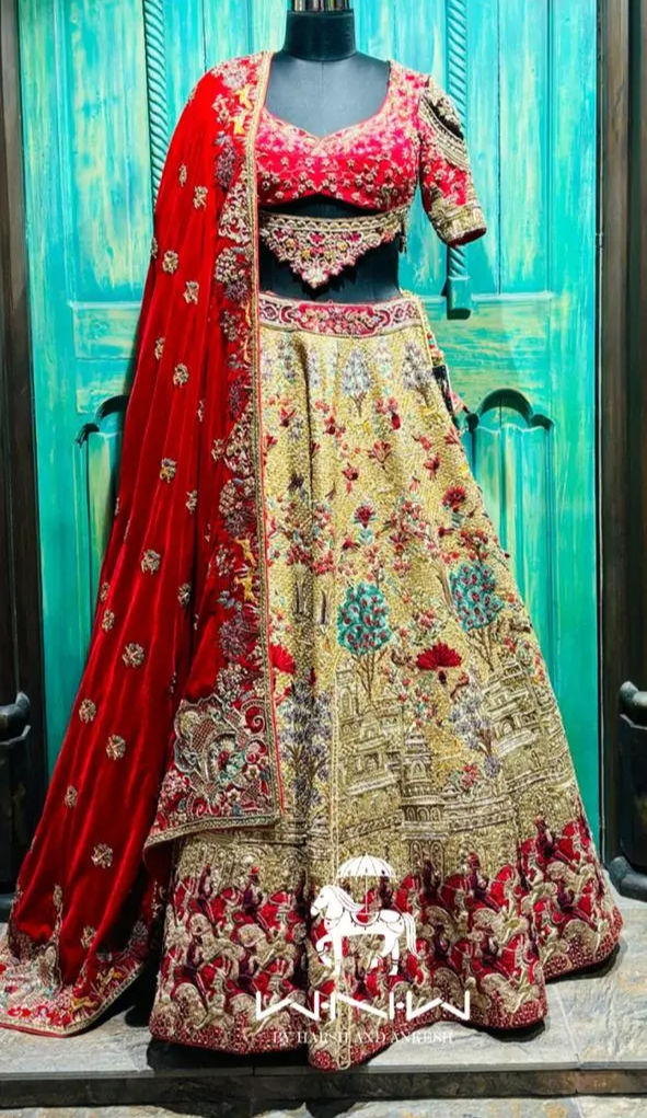 A designer lehenga with embroidery motifs like architecture, royal horses and trees.