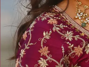 lotus motif in maroon blouse