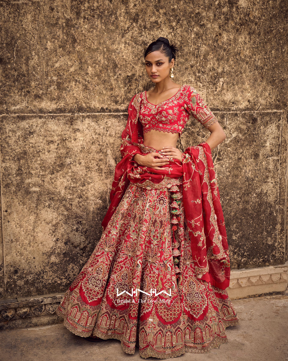 A fully embroidered red lehenga set