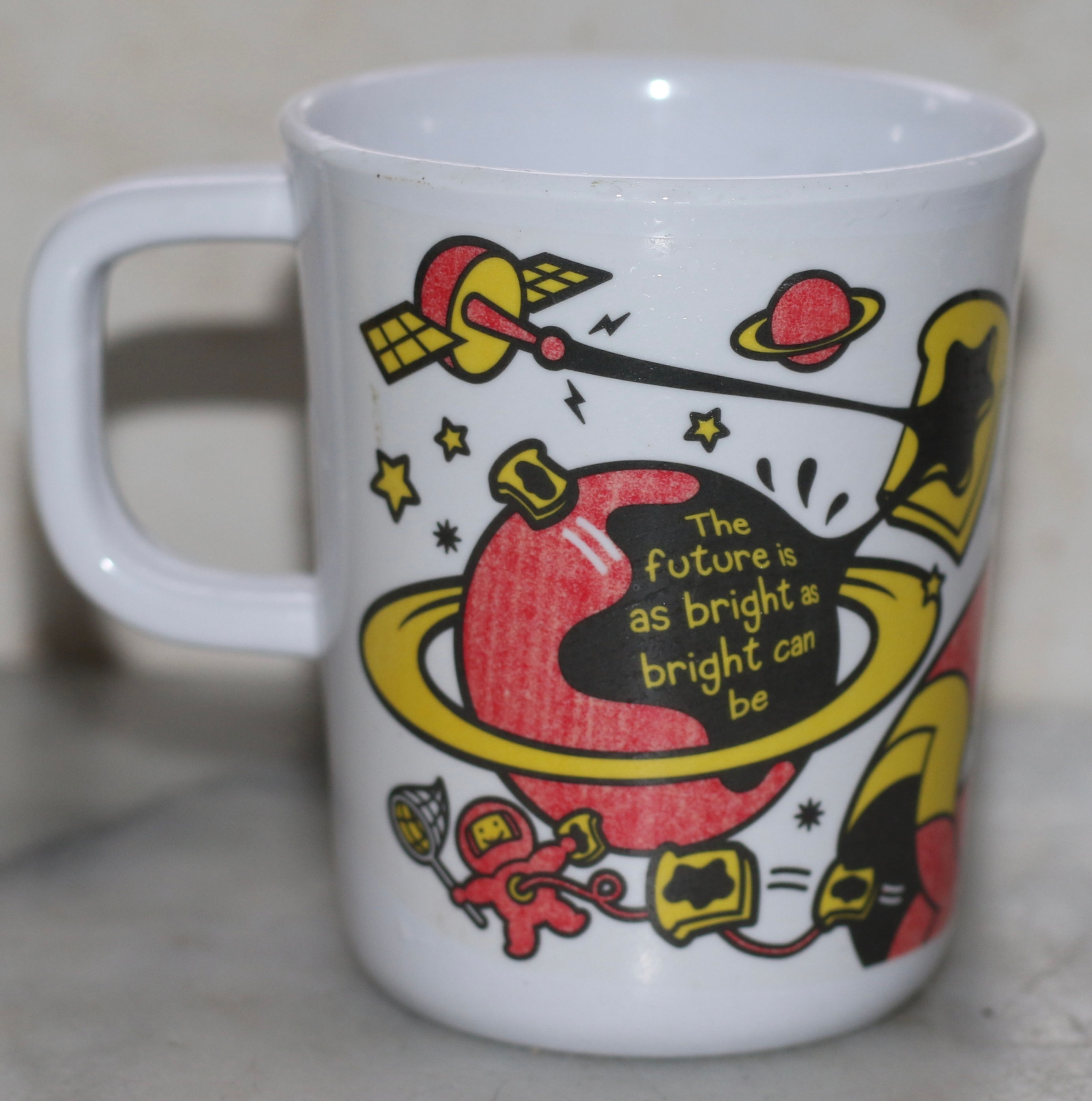 Preloved 2001 limited edition Kraft Vegemite melamine cup, space-themed graphic