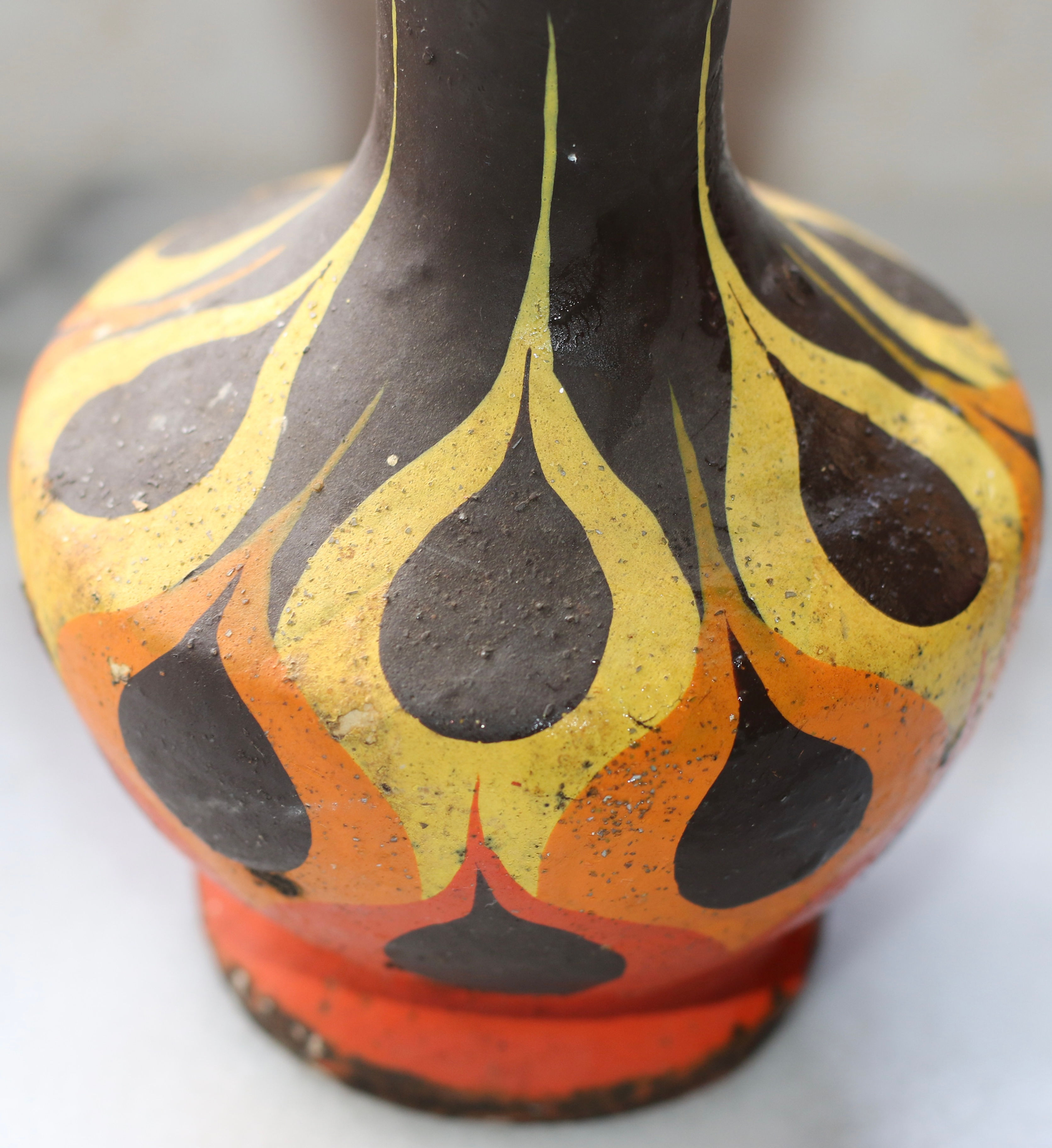 Vintage, hand-painted ceramic or pottery vase with stylized, flame-like pattern