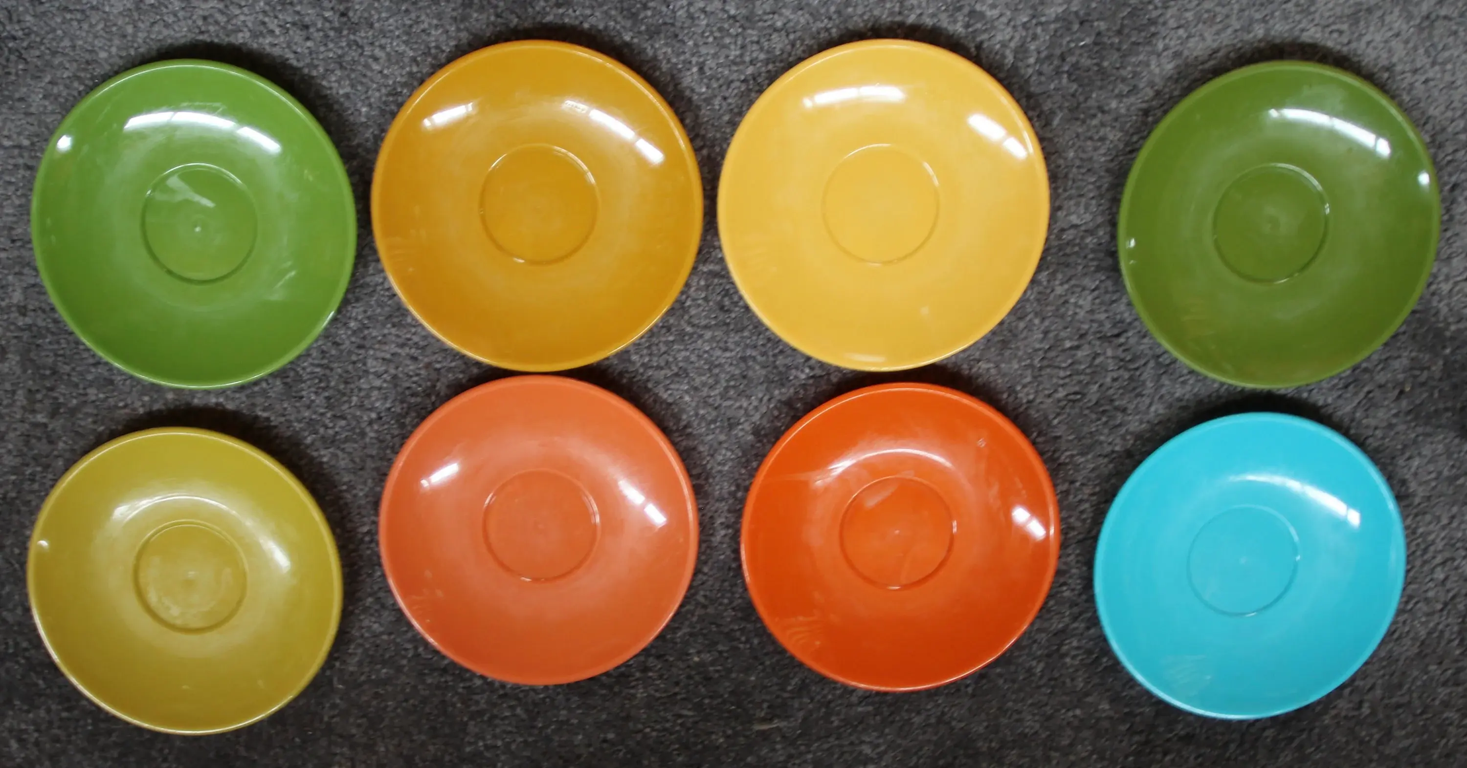 Preloved Set of Eight British Plastics Saucers , Colourful Saucers Set