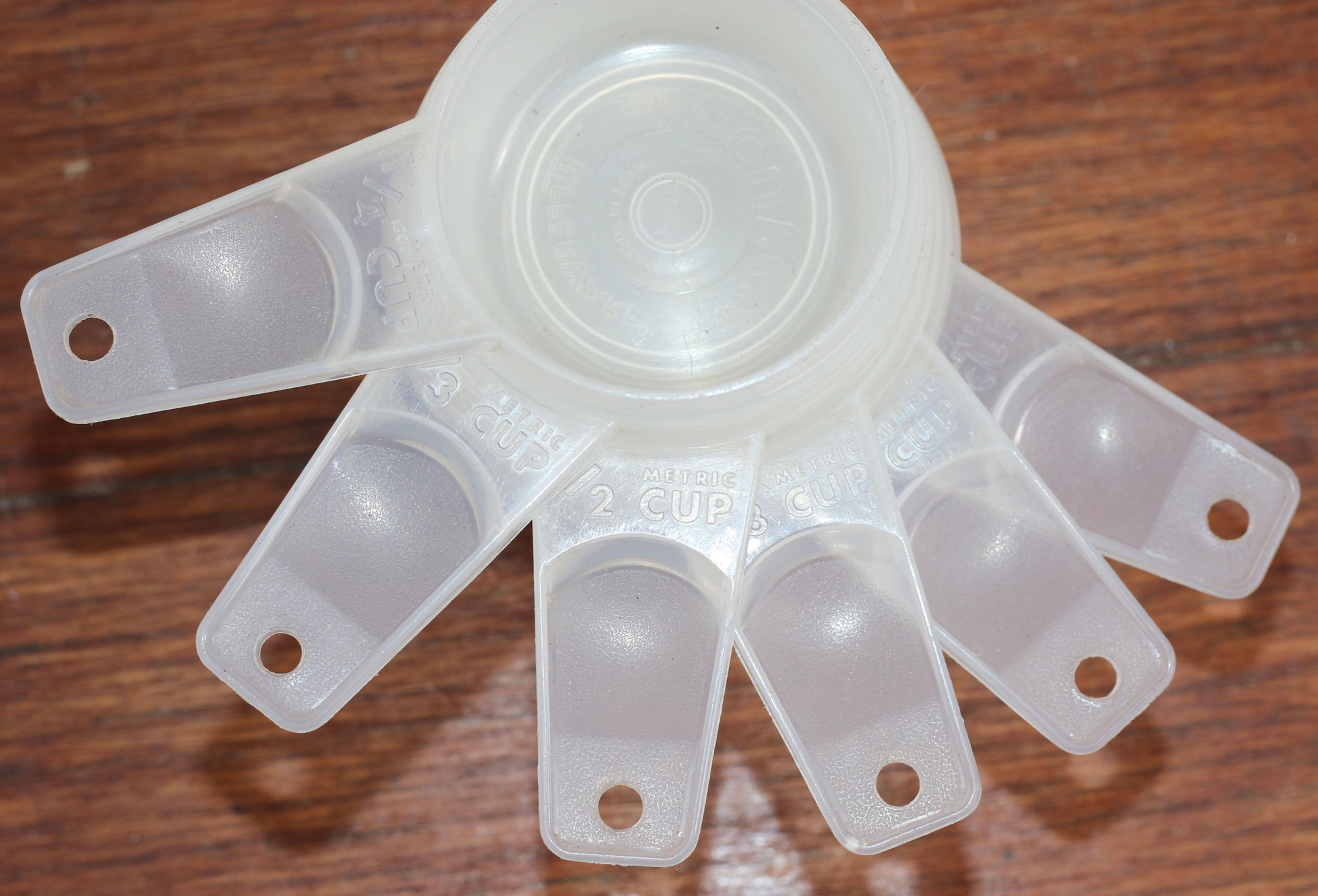 Set of Preloved Tupperware Graduated Measuring Cups