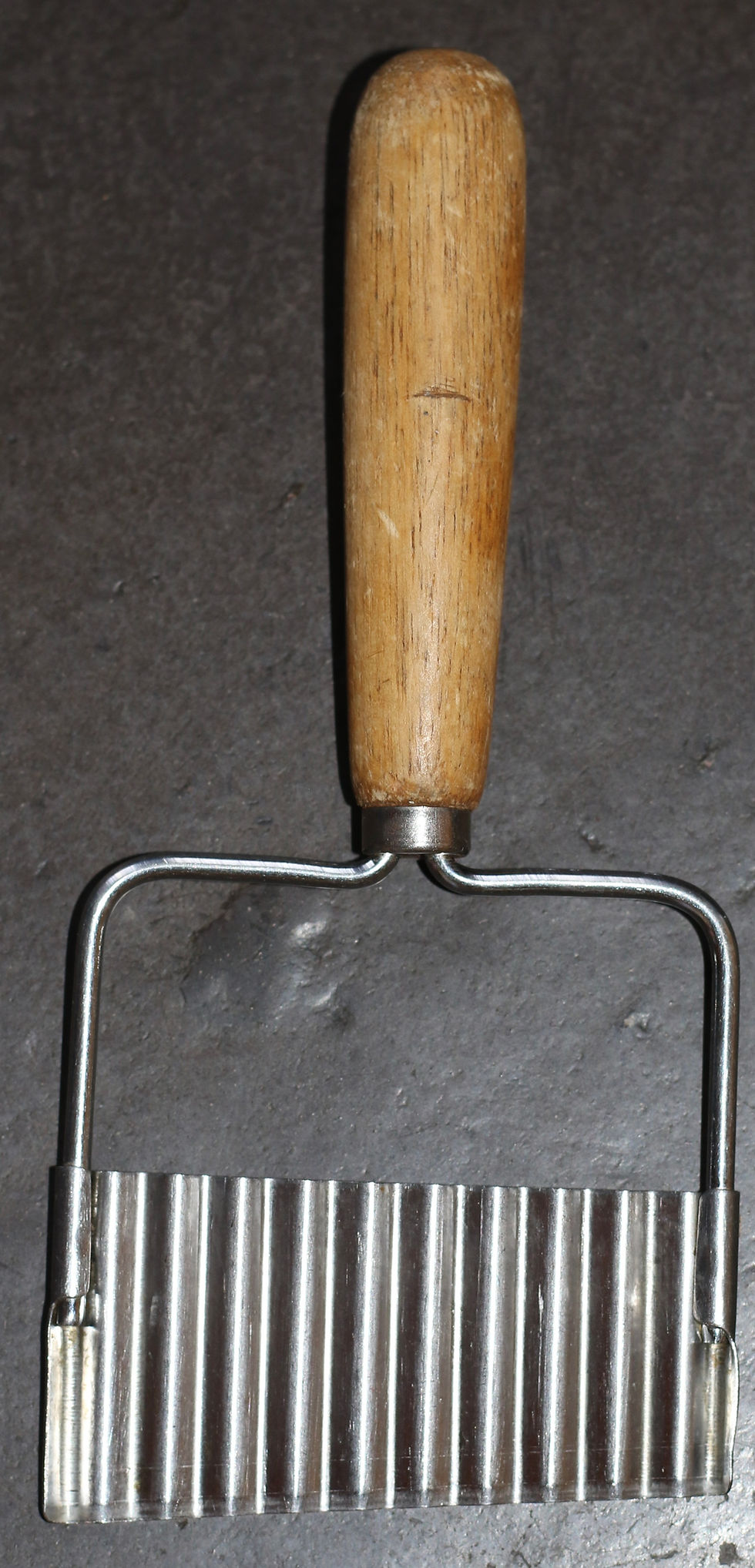 Thumbnail: Preloved Vintage vegetable crinkle slicer with a wood handle and steel blade