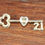 Thumbnail: Preloved Vintage 9 Carat 21st Key Brooch, 9CT Brooch