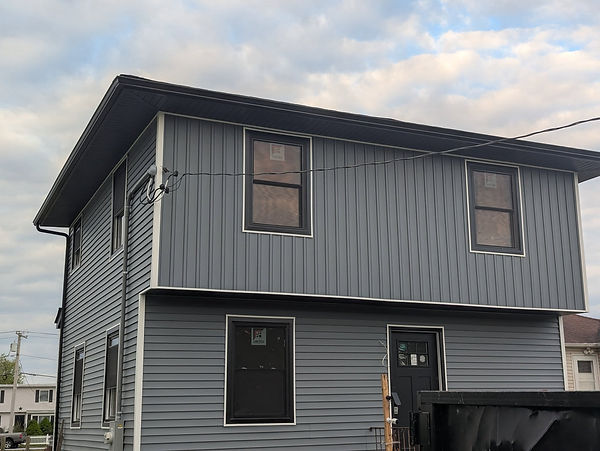 New gutter installation on Long Island home by licensed and insured contractor