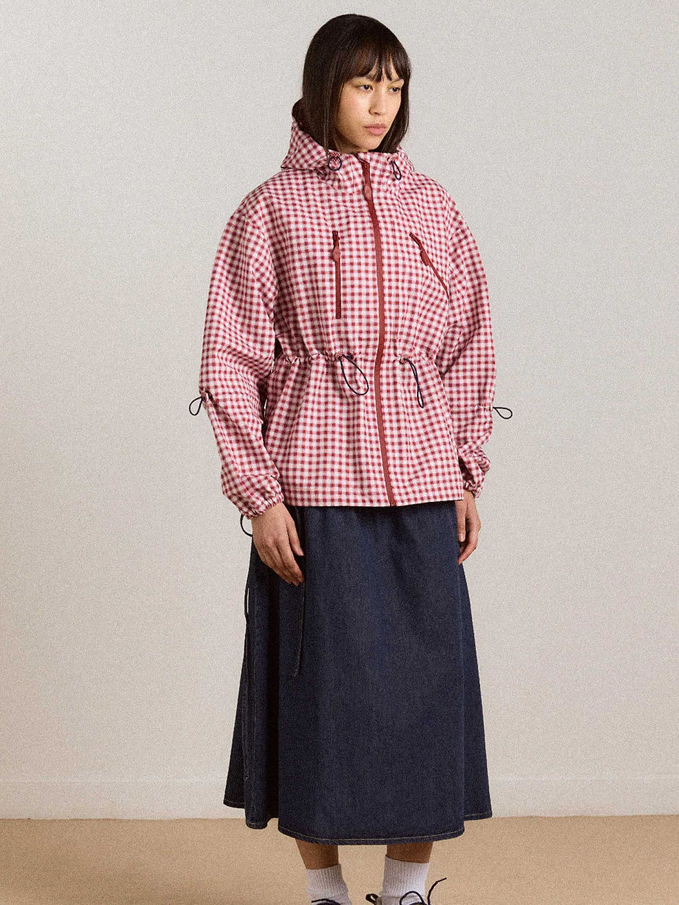Damson Madder womenswear outfit with gingham zip jacket and dark denim skirt